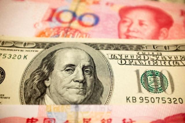 在岸、离岸人民币对美元汇率升破6.9,如何影响居民钱袋子?